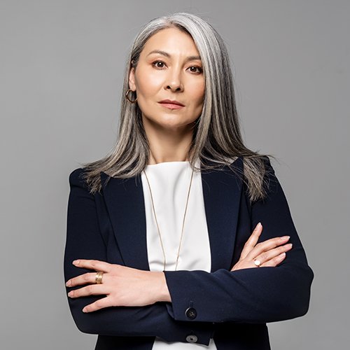 confident-asian-businesswoman-with-grey-hair-and-c-8JLFLNM